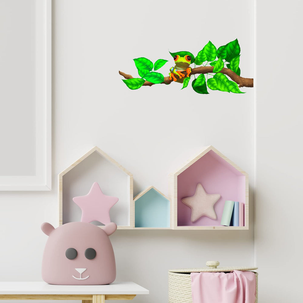 RoyoLam frog on branch wall art on a smooth surface ideal for nurseries and classrooms.