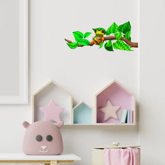 RoyoLam frog on branch wall art on a smooth surface ideal for nurseries and classrooms.