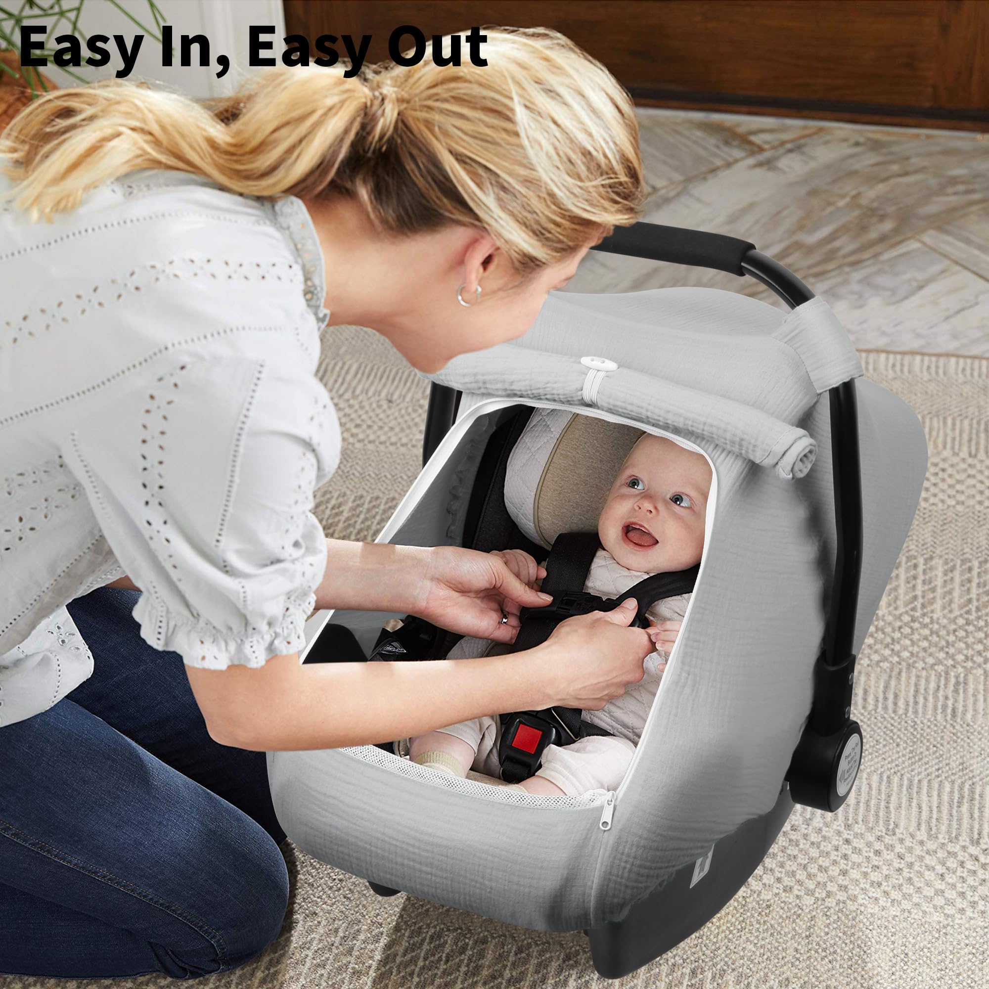 Rquite grey car seat cover blends with car interior while protecting baby.