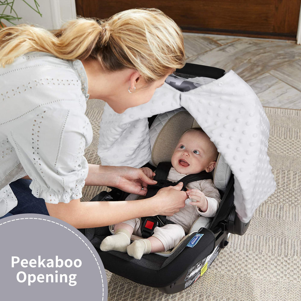 Rquite multiuse baby carrier cover transitions to blanket and mat