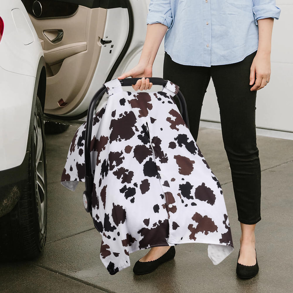 Rquite versatile cover doubles as nursing cover and cozy blanket.