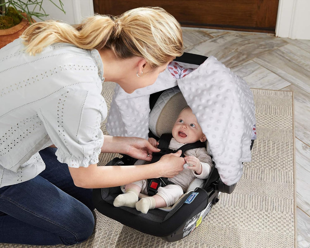 Rquite nursing cover doubles as discreet breastfeeding shield