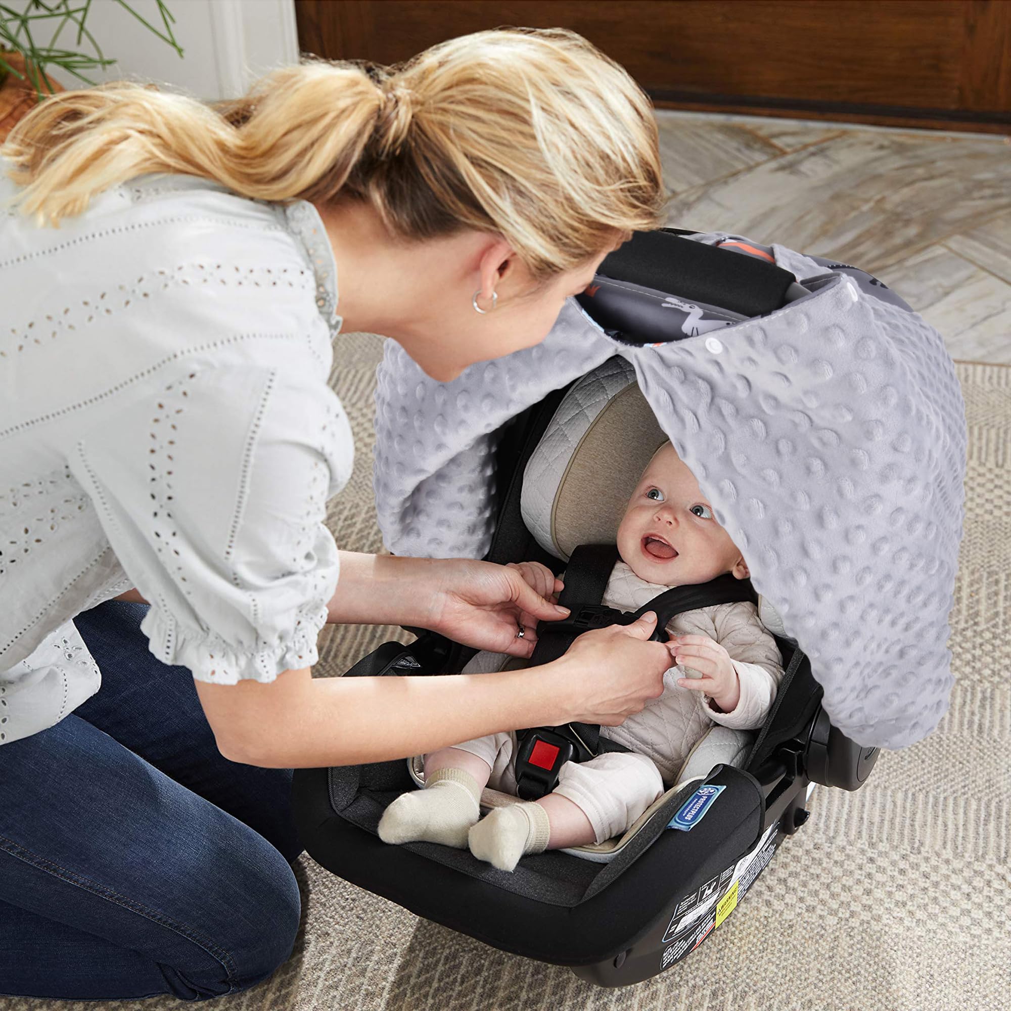 Rquite universal fit covers car seats and strollers securely