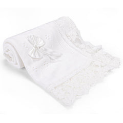 Runeaoys white knit blanket showing soft, cozy material for newborn comfort.