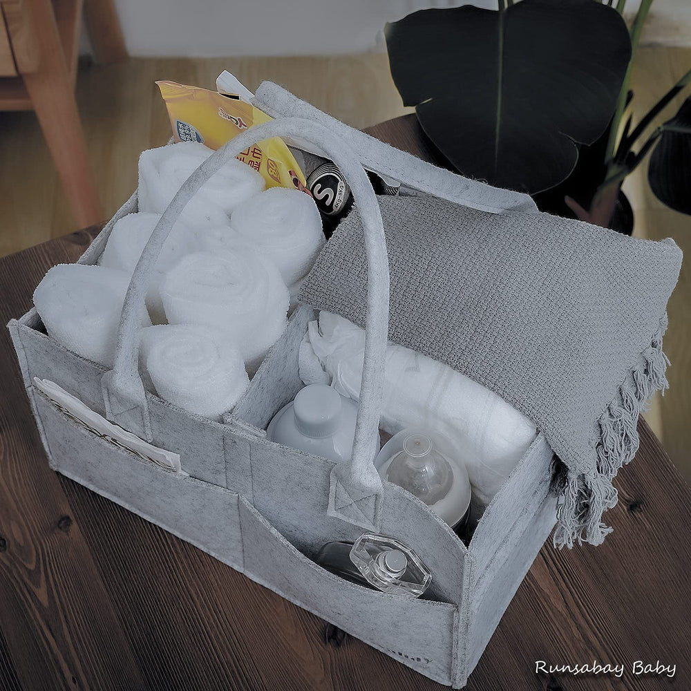 Runsabay diaper caddy used as car organizer during travel.