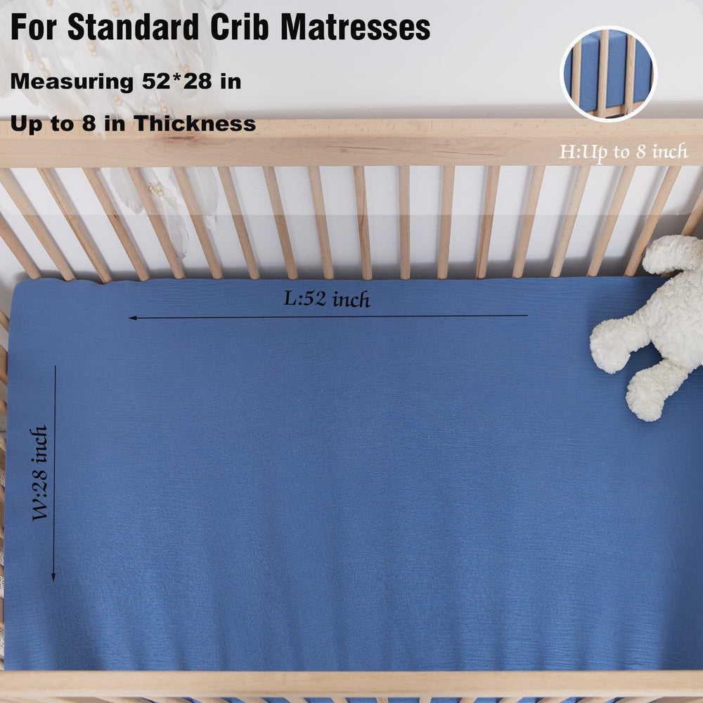 Rutiwa crib sheets on standard mattress show easy swap and care.