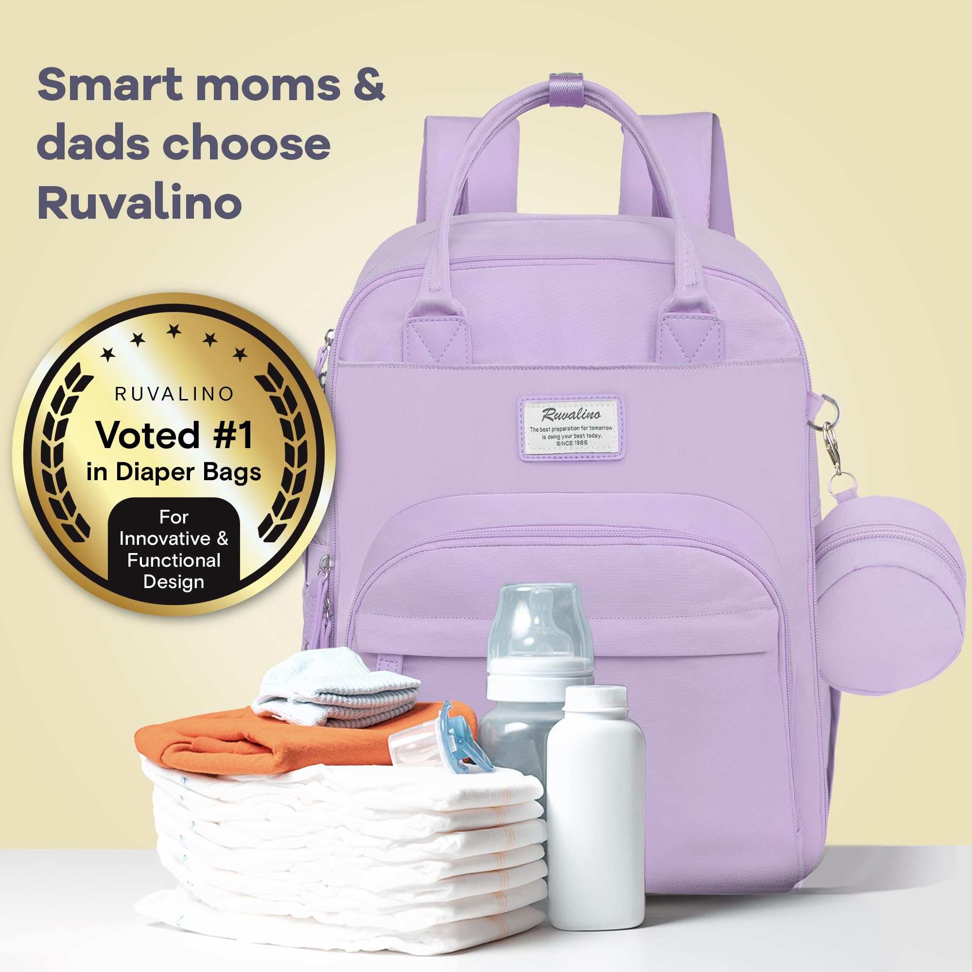 RUVALINO diaper bag backpack waterproof fabric protects contents in rain.
