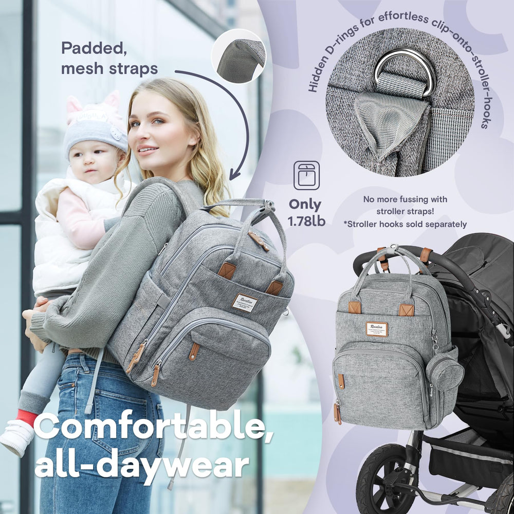RUVALINO diaper bag convertible carry options for backpack, handhold, or stroller attachment.