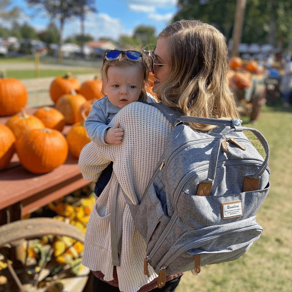 RUVALINO diaper bag waterproof fabric protects contents during rainy outings.