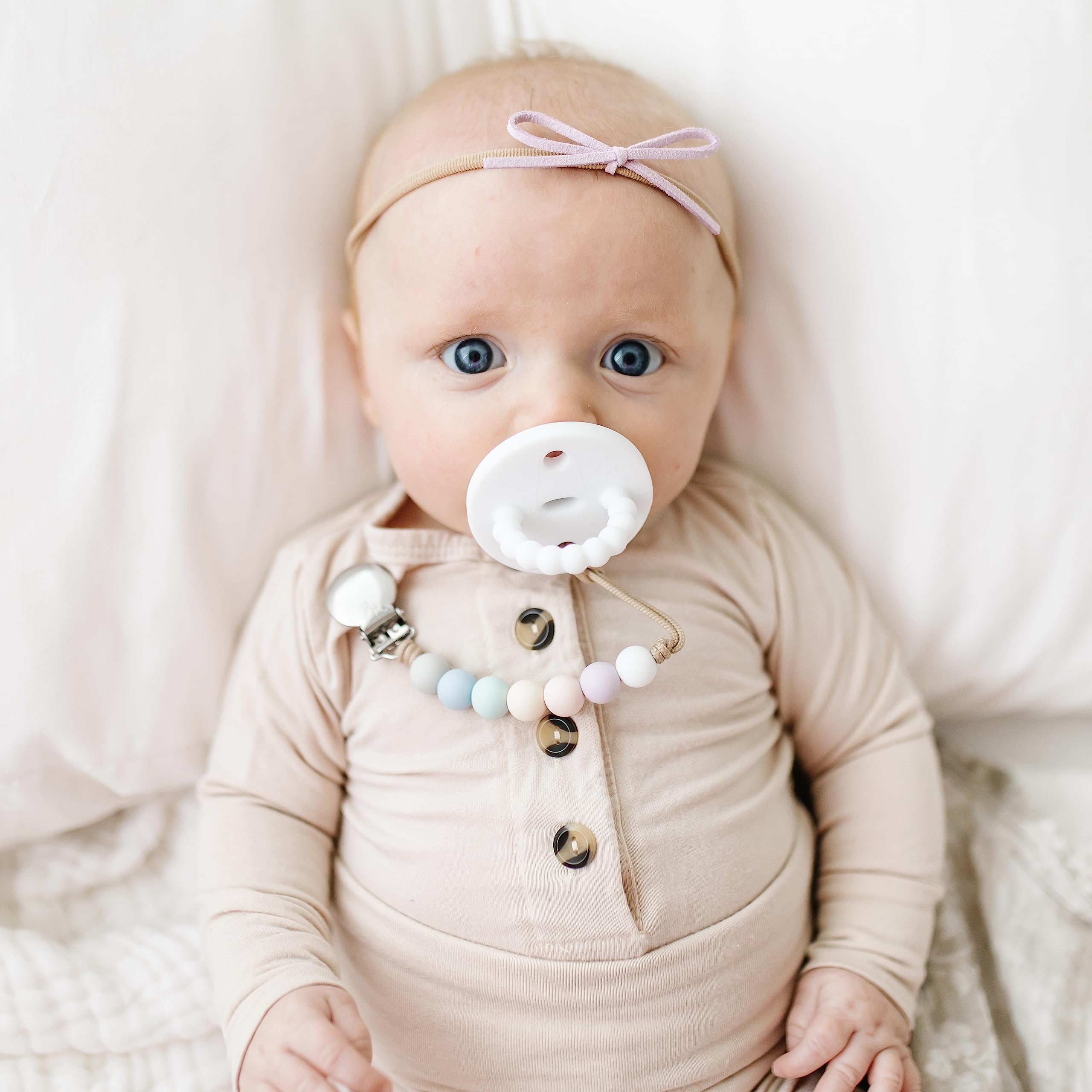 Georgia pacifier clip maxi length shown for easy reach during outings.