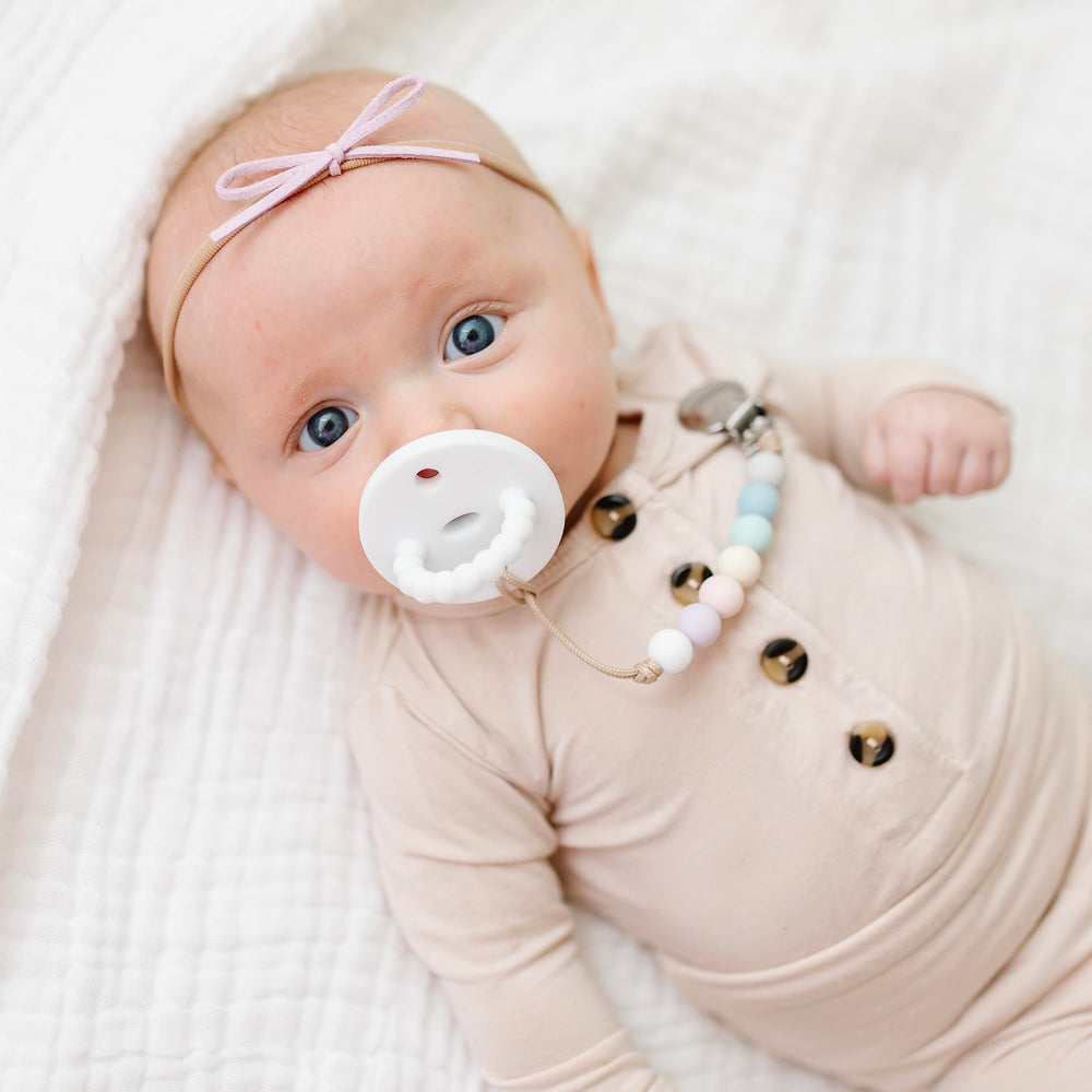 Signature knots and cord design of Ryan & Rose Georgia pacifier clip.
