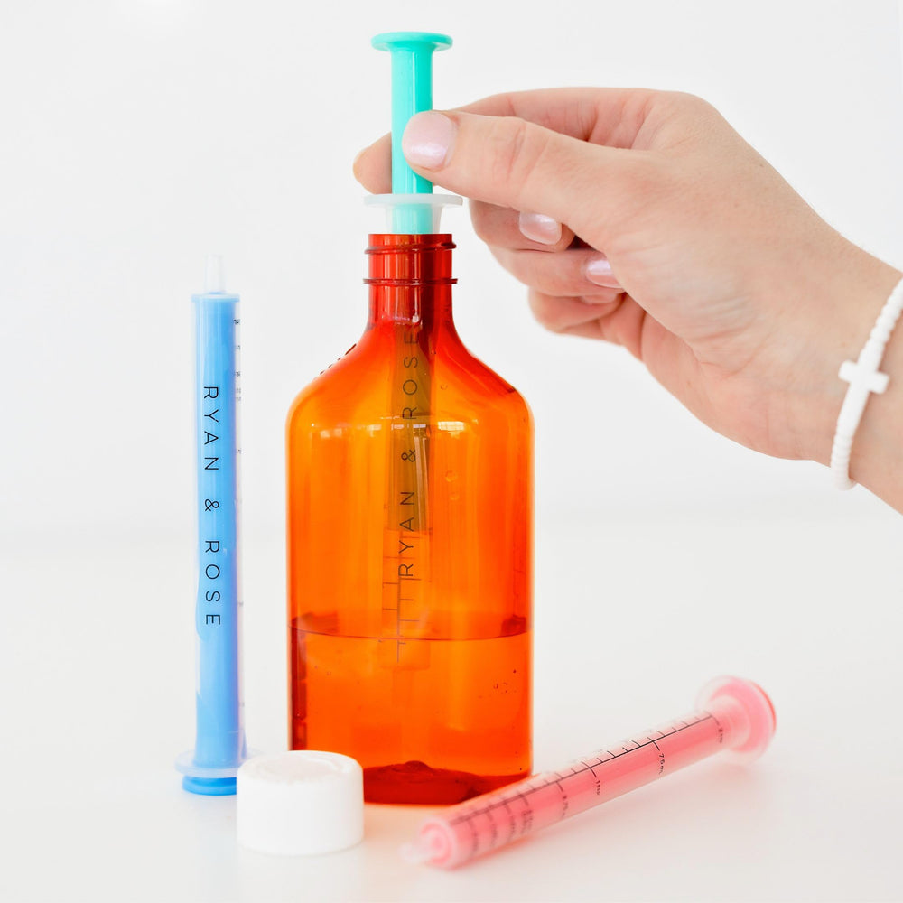 Ryan & Rose Cutie Dose measures up to 10 mL for accurate dosing.