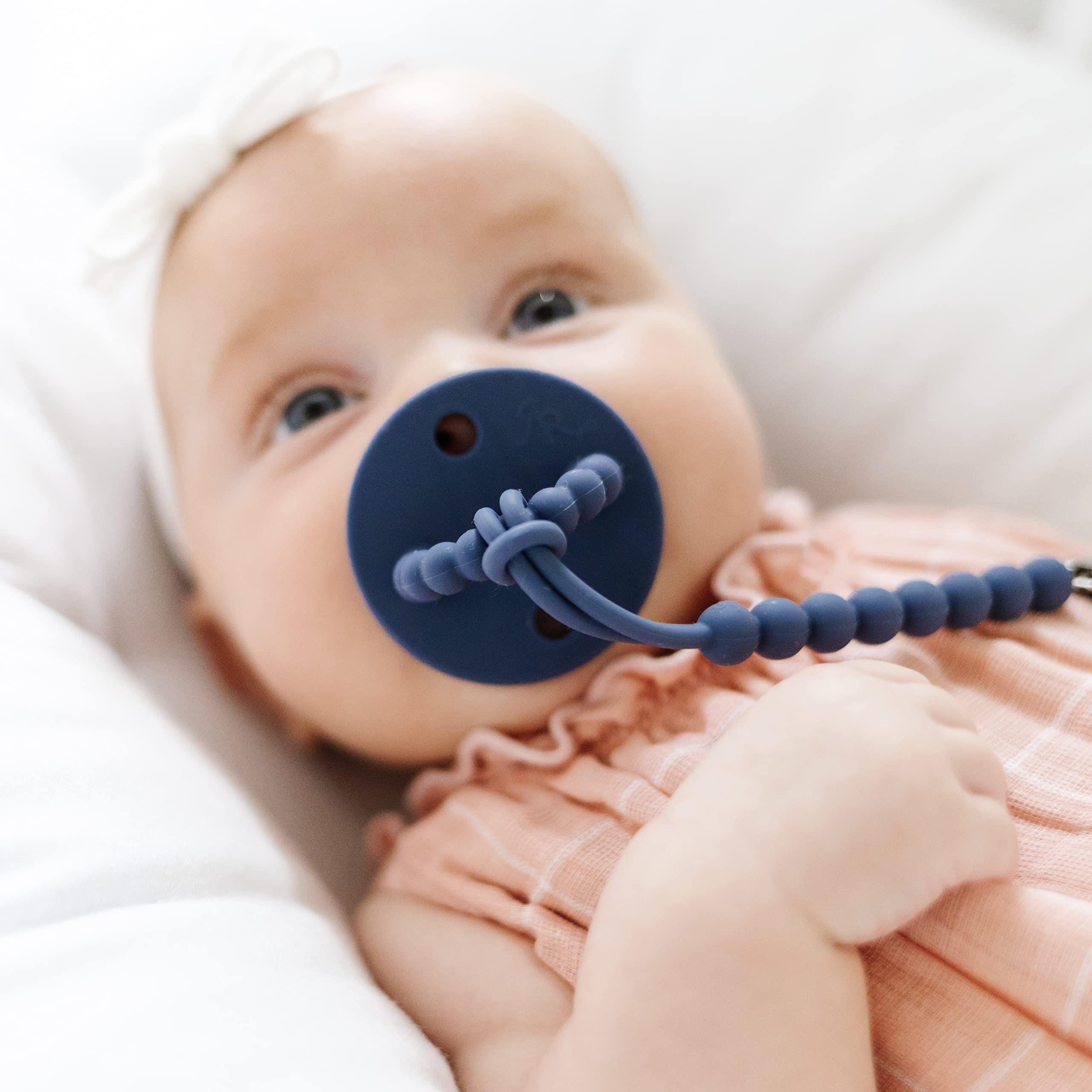 Ryan & Rose Cutie PAT Flat nipple tuck-away: compact teether when nipple isn't used.