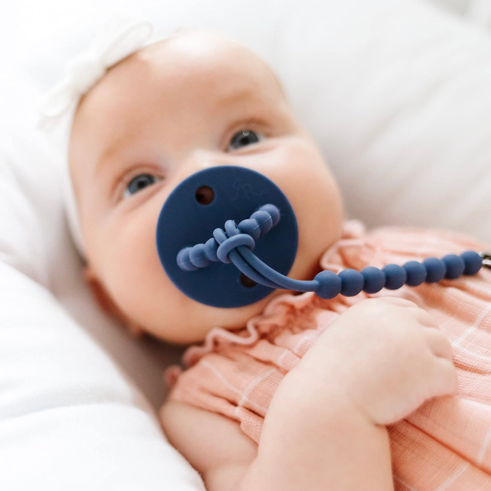 Ryan & Rose Cutie PAT Flat nipple tuck-away: compact teether when nipple isn't used.