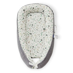 RYXTHALA premium muslin baby lounger folded for travel convenience.