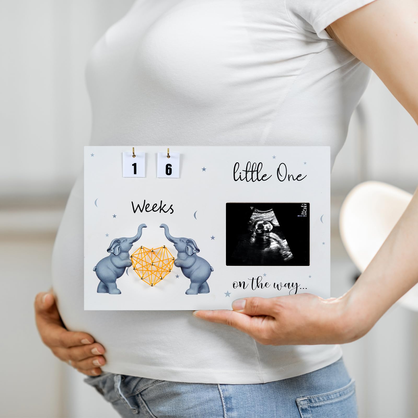 S Divyacoi baby countdown weeks frame highlights milestone pregnancy moments.