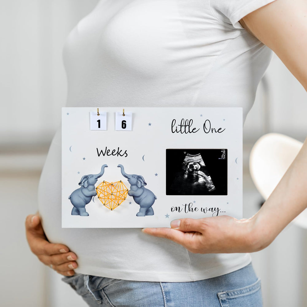 S Divyacoi baby countdown weeks frame highlights milestone pregnancy moments.