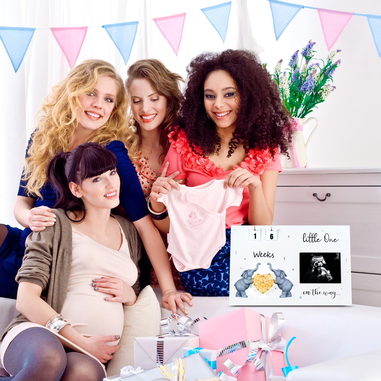 S Divyacoi ultrasound frame includes wall hanger and rope for versatile display.