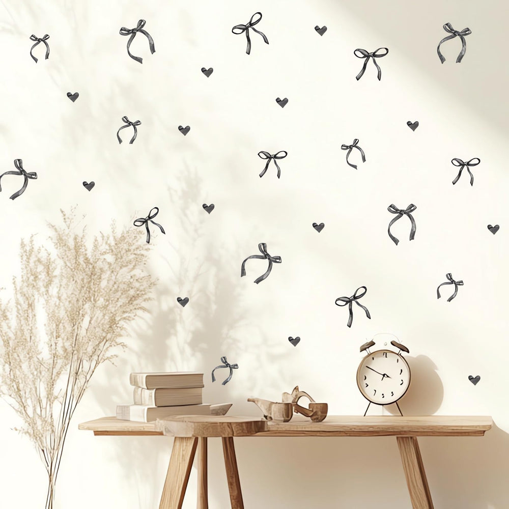 Sacinora black bow wall stickers on sheets for easy peel-and-stick decor.