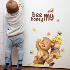 Sacinora bee and bear decal shown on fridge, adding whimsy to kitchen decor.