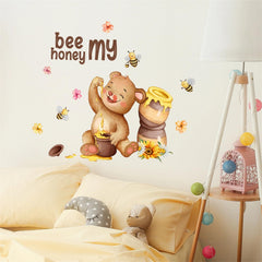 Cute honey jar sticker in a nursery creates a warm, cozy atmosphere.