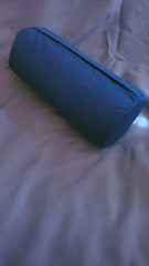 Sacro Wedgy neck cushion close-up highlighting compact neck roll design for travel.