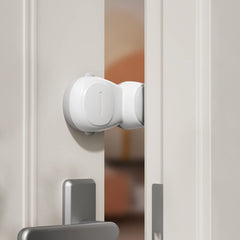 SAFELON astronaut door stopper demonstrates kid-safe design preventing finger pinches in doors