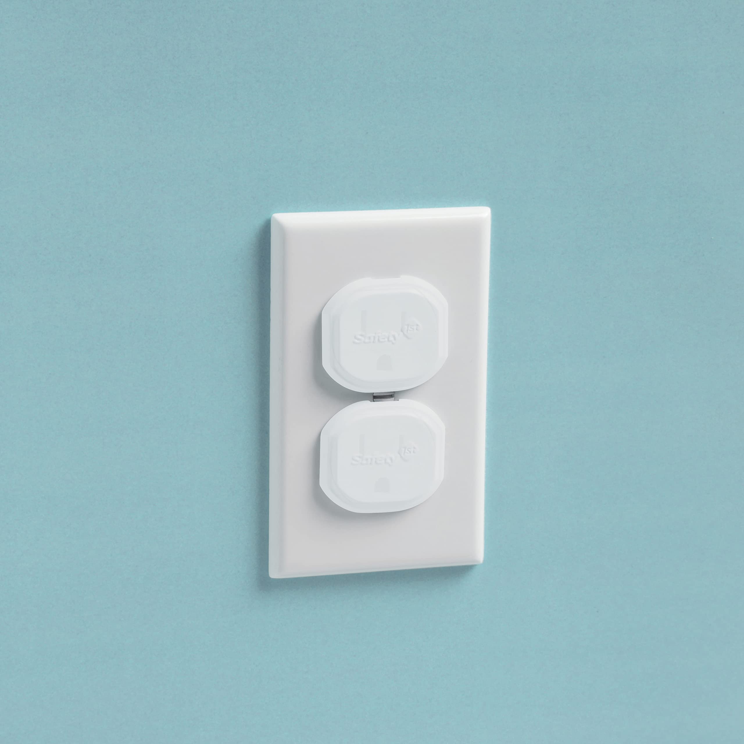 Safety 1st Secure Press plug protectors kit shown in packaging, easy to install across rooms for consistent safety.