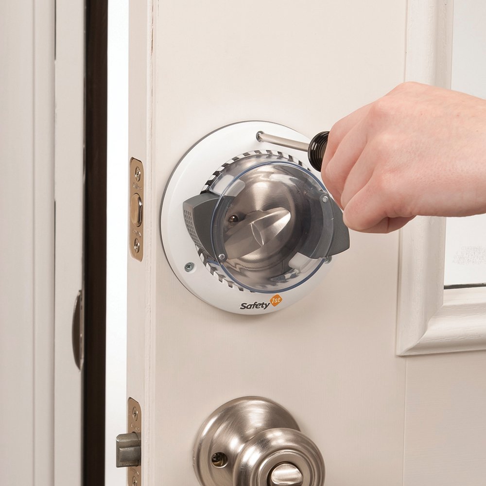 Safety 1st Secure Mount Deadbolt Lock installed behind existing hardware on a door