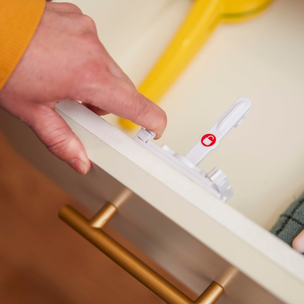 Safety 1st adhesive locks fit many cabinet styles for adaptable childproofing.