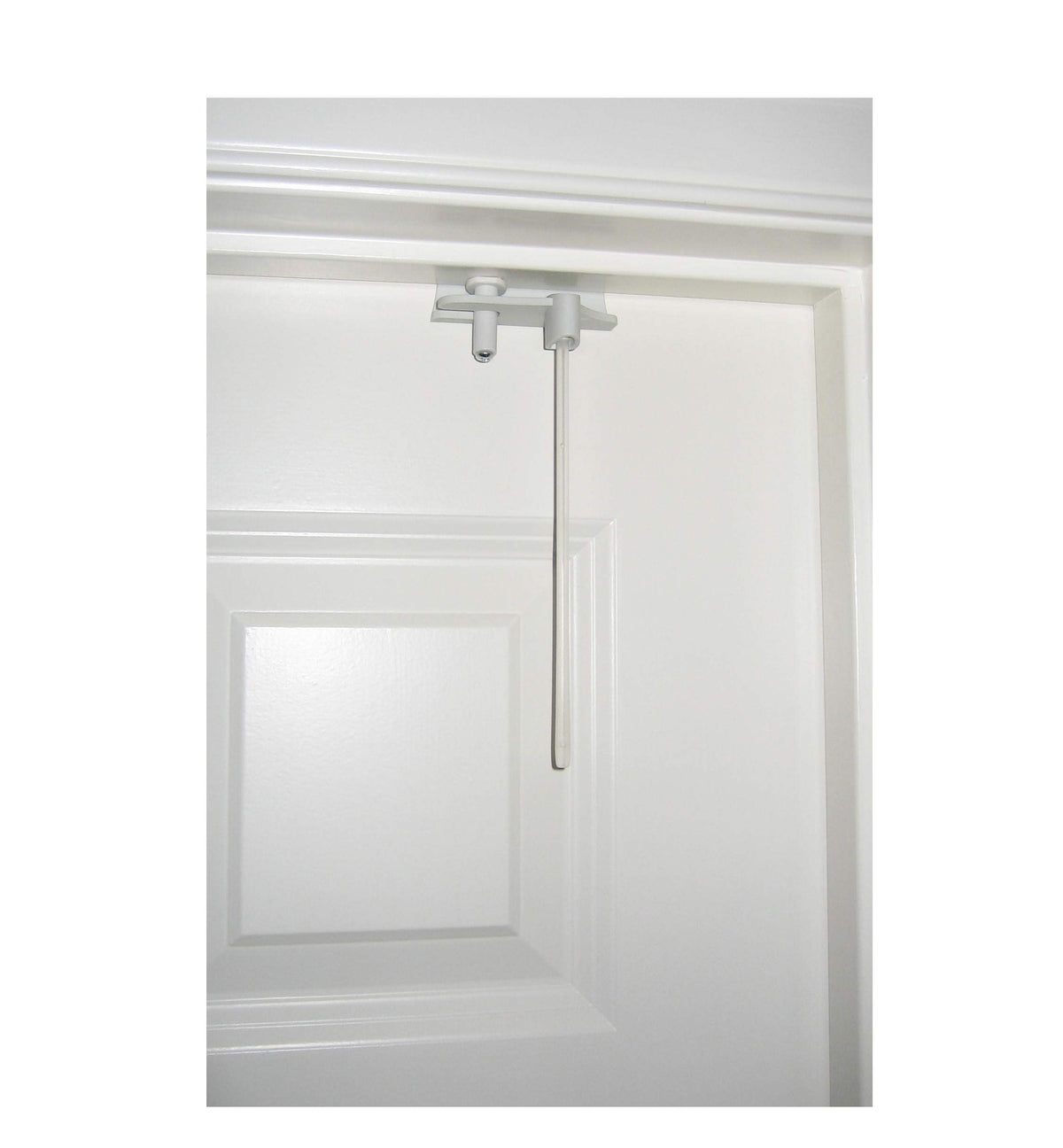 Safety Innovations deluxe top door lock installed on door for added child safety.
