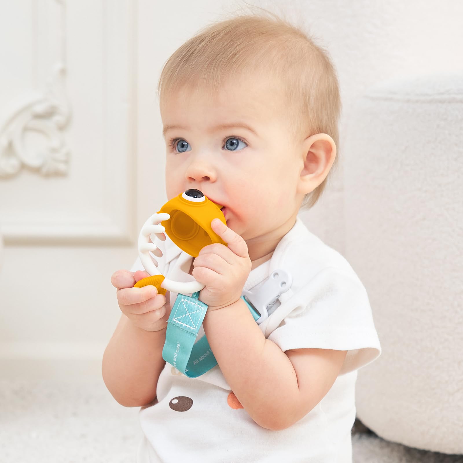 Saffron teether compact on-the-go design fits a diaper bag