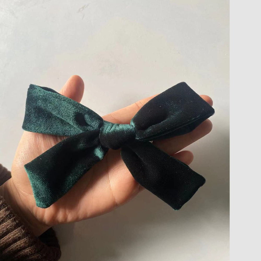SALOCY velvet bow on braid detail highlights soft texture for comfortable all-day wear.