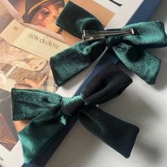 SALOCY velvet bows on ponytail demonstrates easy dress-up for everyday wear.