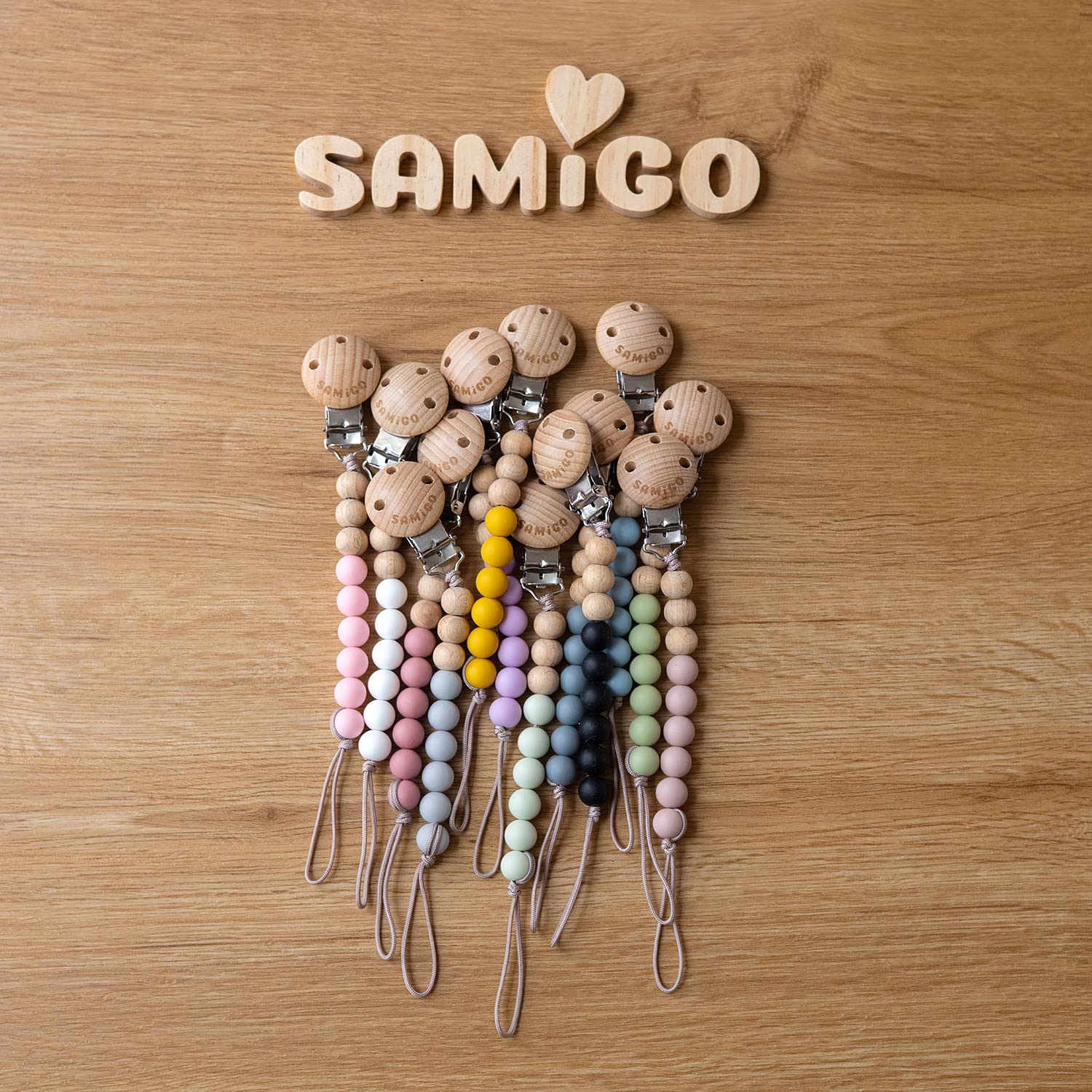 SAMiGO clip design supports safe, quick pacifier access during outings.