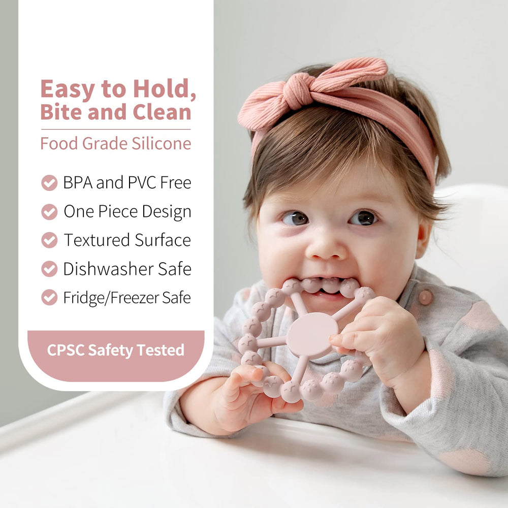 SAMiGO ring teether soft and flexible for tiny hands and gentle gums.