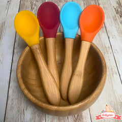 SAN SERO travel-friendly baby spoon set in yellow for on-the-go meals.