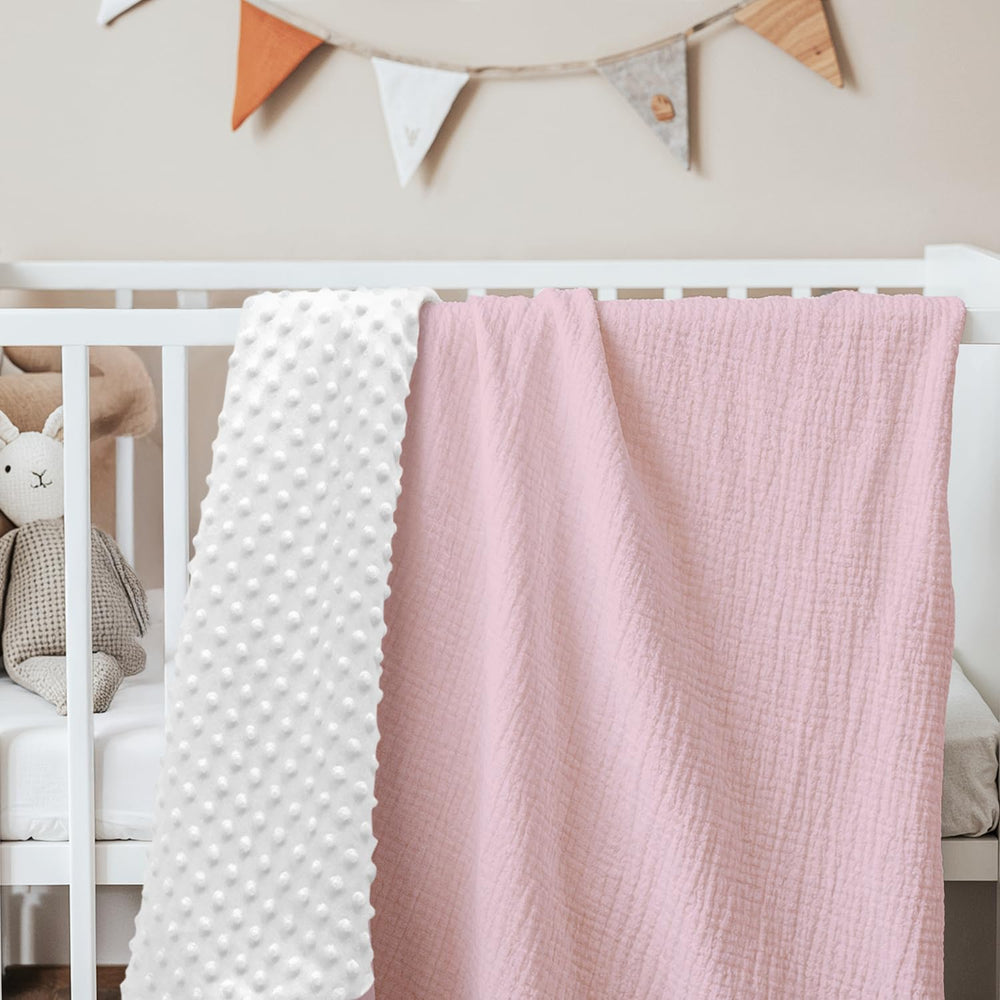 Compact folded SANDJEST baby blanket ready for on-the-go use