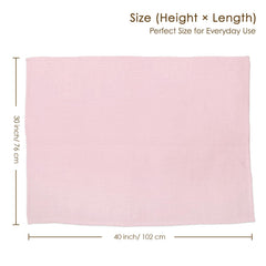 SANDJEST baby blanket in a crib setting with soft pink tones