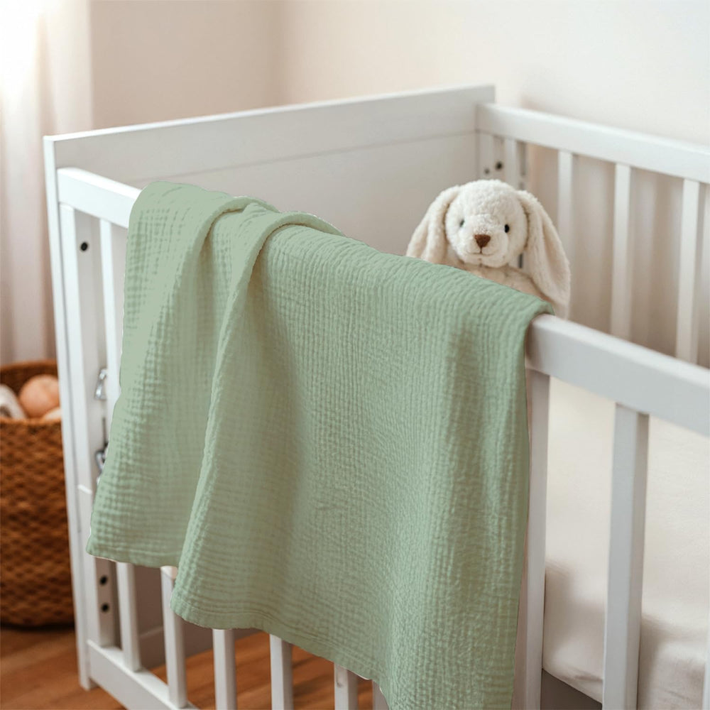 SANDJEST nursery blanket in a cheerful green tone enhances the space.