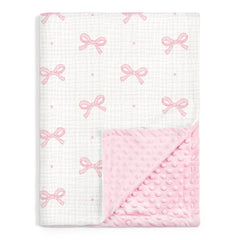 SANDJEST Bow Baby Blanket with muslin side for breathable, soothing comfort.