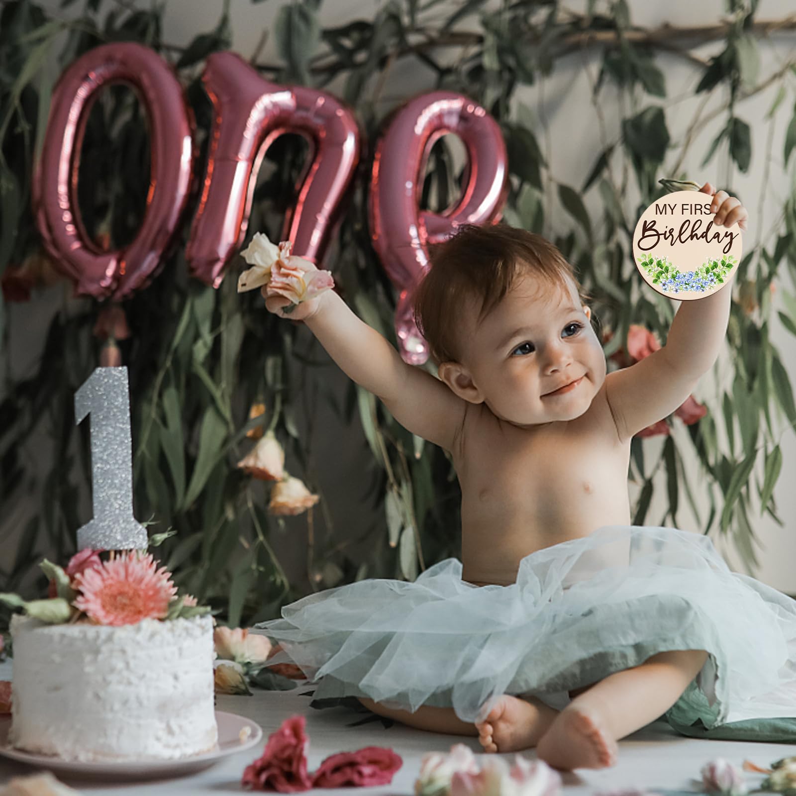 Sanyakti twelve-month milestone card marks a year of growth in photos.