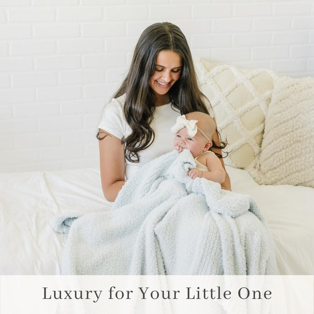 Saranoni Bamboni blanket in a movie-night setup inviting relaxation