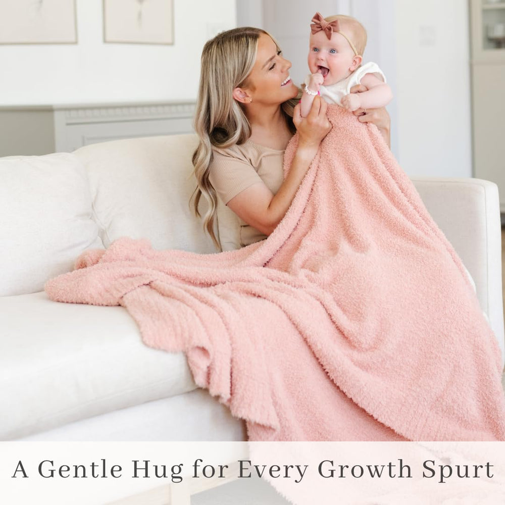 SARANONI Bamboni peach blanket wrapped as a thoughtful baby gift