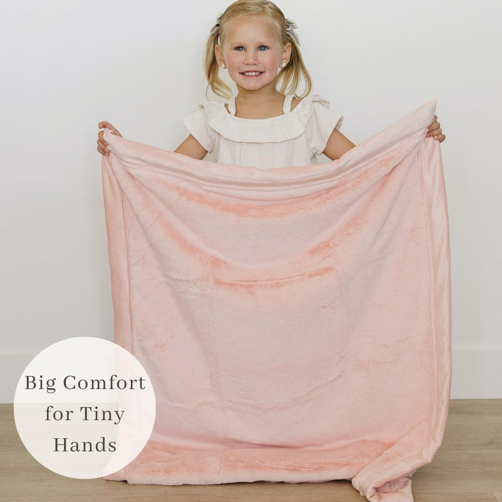 SARANONI easy-care blanket; machine wash cold and air dry.