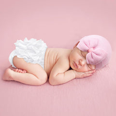 Sarfel baby diaper cover back view showing ruffles for a cute look.