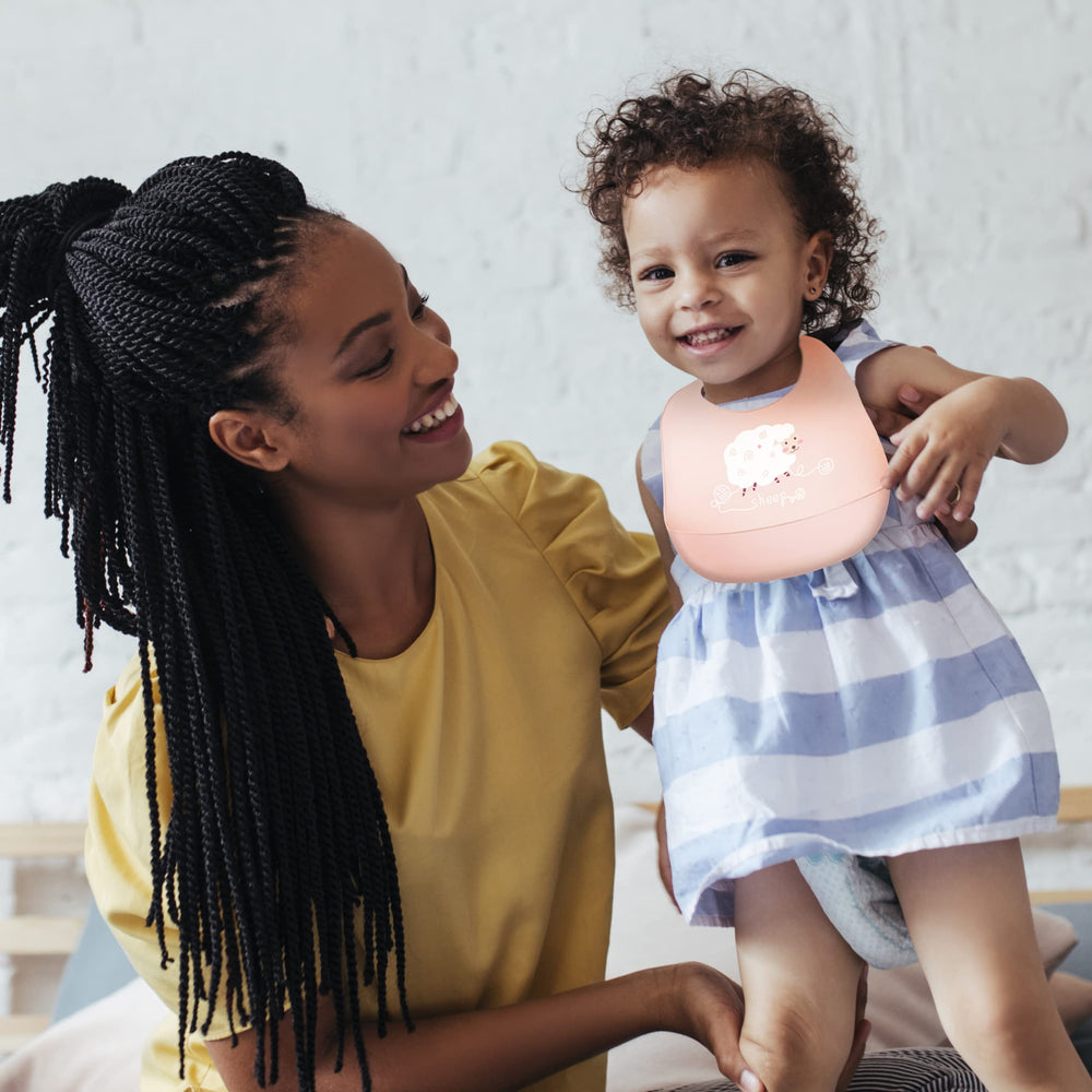 Sarvoza travel-friendly bib rolls up for on-the-go use.