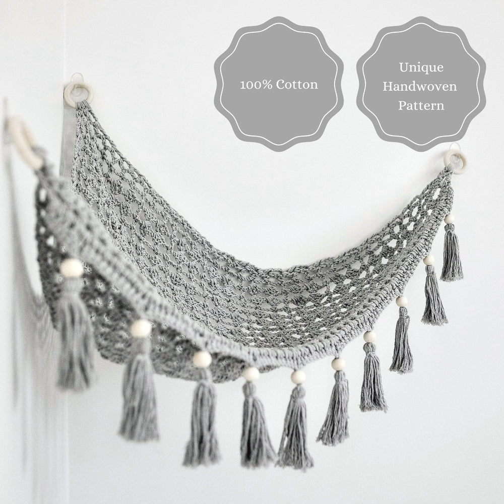 Sasa Baby and Toddler Macrame Toy Hammock featuring fringe tassels for boho charm and organization.