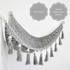 Sasa Baby and Toddler Macrame Toy Hammock featuring fringe tassels for boho charm and organization.
