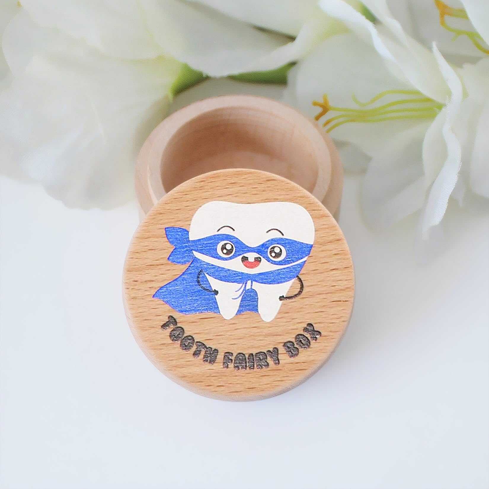 Sbarklo compact keepsake stores up to ten teeth for future memories.